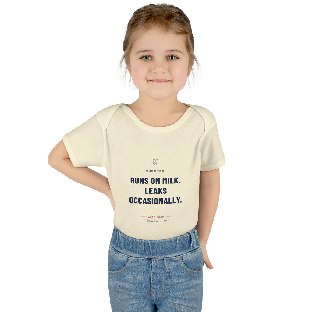Runs On Milk. Leaks Occasionally. — Auto Tech Baby Bodysuit