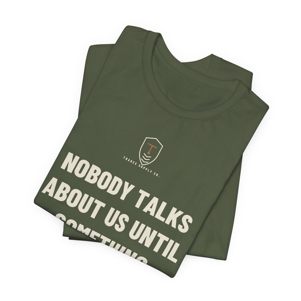 Nobody Talks About Us Until Something Breaks — Trades T-Shirt