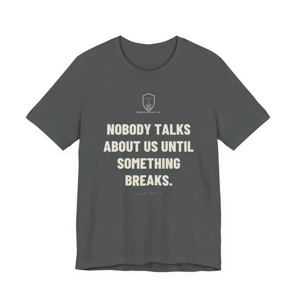 Nobody Talks About Us Until Something Breaks — Trades T-Shirt