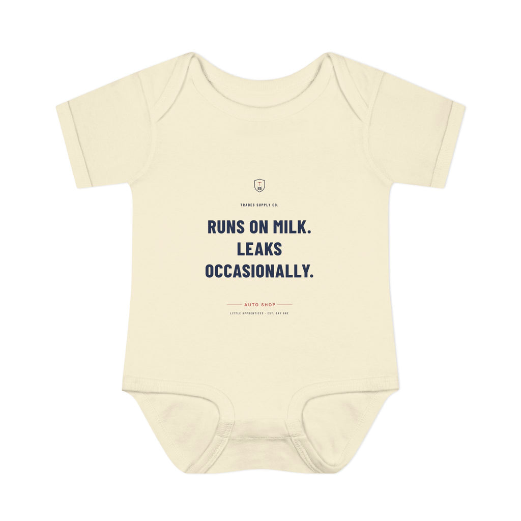 Runs On Milk. Leaks Occasionally. — Auto Tech Baby Bodysuit